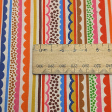 Load image into Gallery viewer, Close up flat lay of Thread and Ink 100% Cotton, Ziggy Ecru with colourful ric rac design, ruler included for scale - for sale at Minerva's Bower