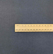 Load image into Gallery viewer, Flat lay of Avery, a heavyweight tencel twill, in a navy colourway. Available at Minerva&#39;s Bower. Ruler included for scale