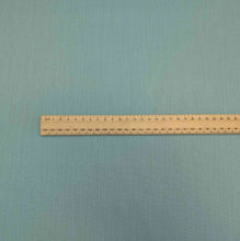 Load image into Gallery viewer, Flat lay of cotton denim, in duck egg colourway. Available at Minerva&#39;s Bower. Ruler included for scale