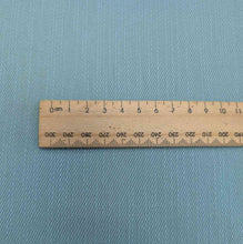 Load image into Gallery viewer, Flat lay of cotton denim, in duck egg colourway. Available at Minerva&#39;s Bower. Ruler included for scale