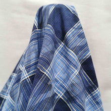 Load image into Gallery viewer, Flat lay of cotton ripple check. Made in Japan. Available at MInerva&#39;s Bower. Fabric draped to show how it handles