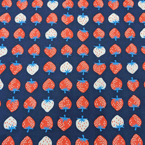 Flat lay of pure cotton, strawberries, by ruby star society. Made in Japan. Available at Minerva's Bower