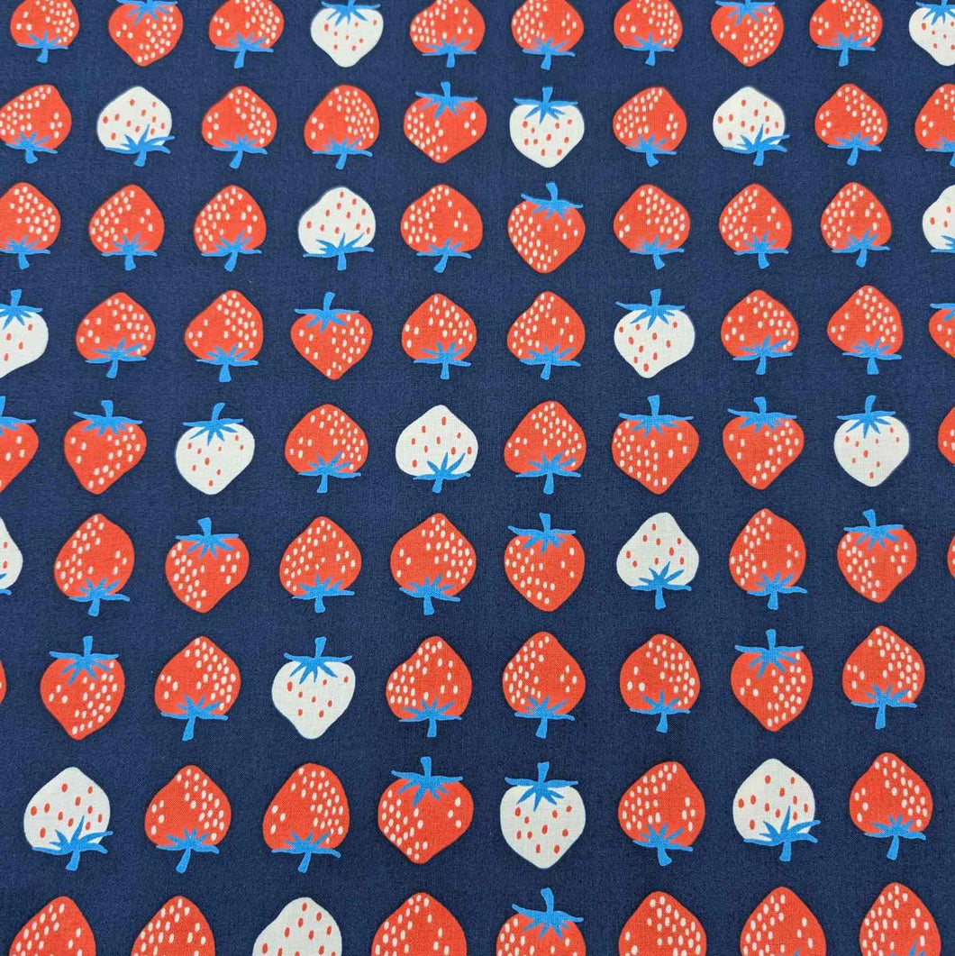 Flat lay of pure cotton, strawberries, by ruby star society. Made in Japan. Available at Minerva's Bower