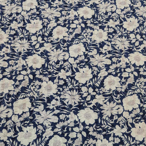 Flat lay of pure cotton seersucker in blue country floral design. Made in Japan by Kokka. Available at Minerva's Bower