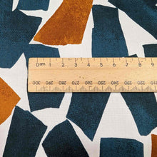 Load image into Gallery viewer, Flat lay of fine cotton, in a falling blocks design, in teal colourway. Made in Japan by Kokka. Available at Minerva&#39;s Bower. Ruler included for scale