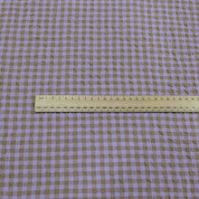 Load image into Gallery viewer, Gemma seersucker linen rayon blend, in lilac colourway. Available at Minerva&#39;s Bower. Ruler included for scale