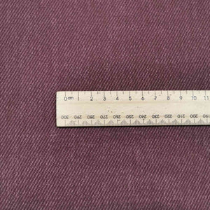 Kennedy is a heavyweight pure cotton drill. A deep mulberry colour, available at Minerva's Bower. Image includes a ruler for scale