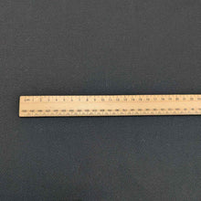 Load image into Gallery viewer, Flat lay for kennedy washed cotton drill in black colourway. Available at Minerva&#39;s Bower. Ruler included for scale