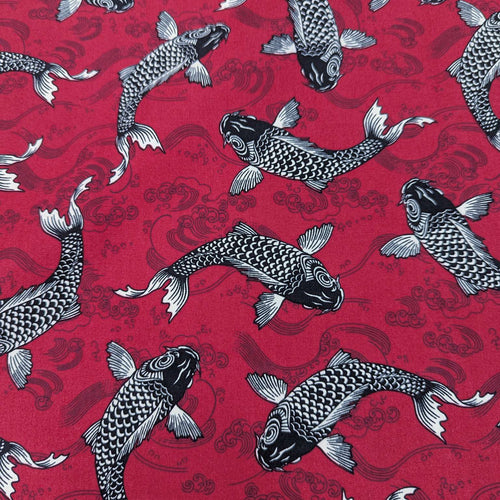 Flat lay of 100% cotton poplin, pre shrunk, koi red, for sale at Minerva's Bower 