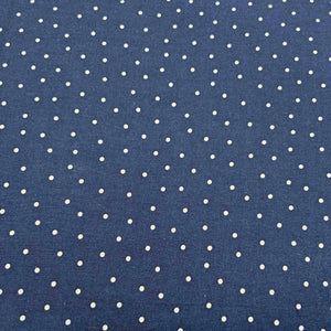 Flat lay of cotton linen spot fabric, in navy colourway. Made in Japan, by Kokka. Available at Minerva's Bower