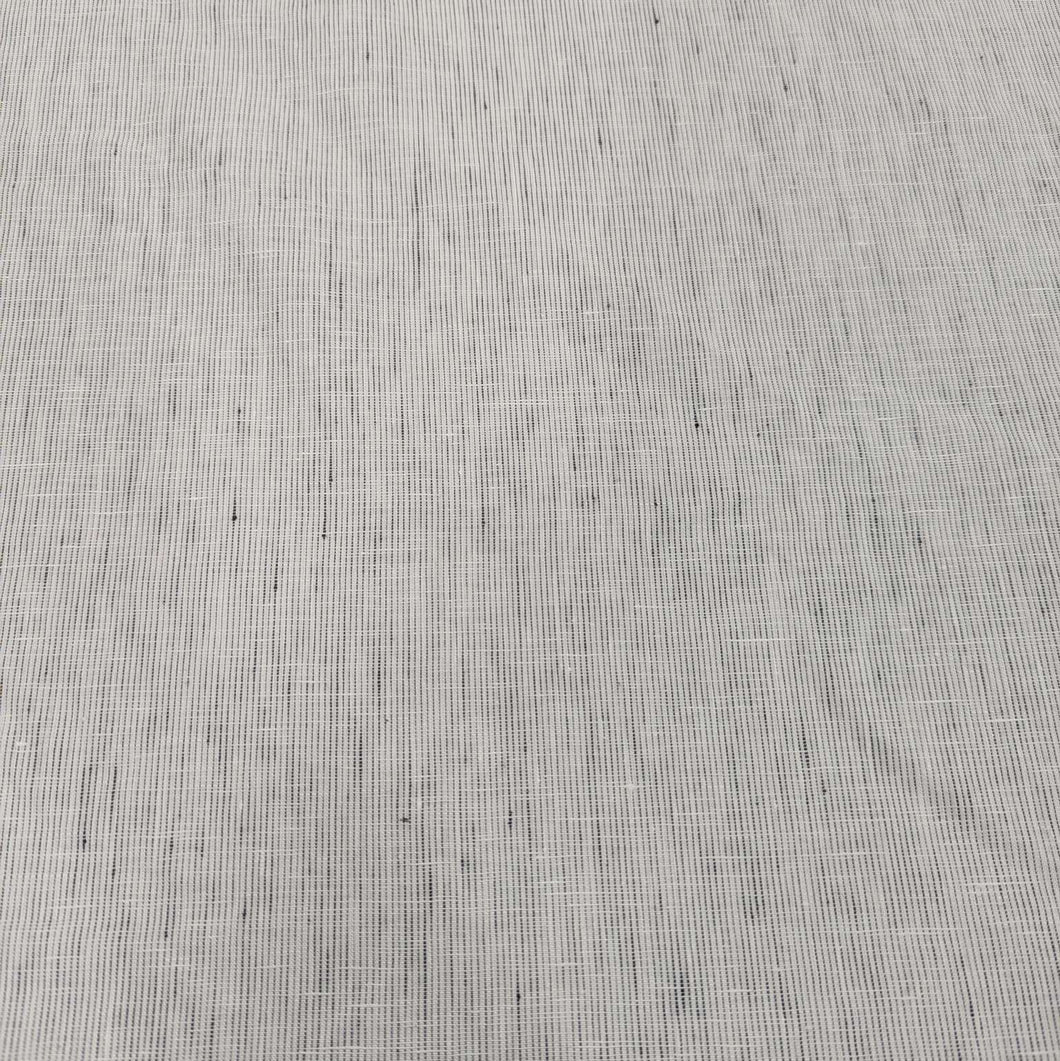 Flat lay of pure linen in a fine charcoal pinstripe. Available at Minerva's Bower