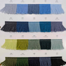 Load image into Gallery viewer, Color swatches of knitted fabric in various colors on a white background