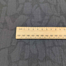 Load image into Gallery viewer, Ruler on a textured black muno jacquard fabric background. Available at Minerva&#39;s Bower