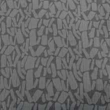 Load image into Gallery viewer, Patterned graphite muno jacquard fabric with abstract shapes on a grey background. Available at Minerva&#39;s Bower