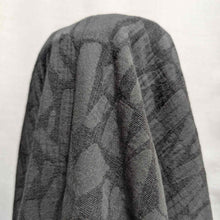 Load image into Gallery viewer, Graphite muno jacquard textured fabric draped over a white background. Available at Minerva&#39;s Bower