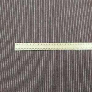Brown fabric with white stripes and a ruler for scale. Available at Minerva's Bower