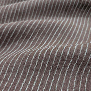 Close-up of brown fabric with white pinstripes. Available at Minerva's Bower
