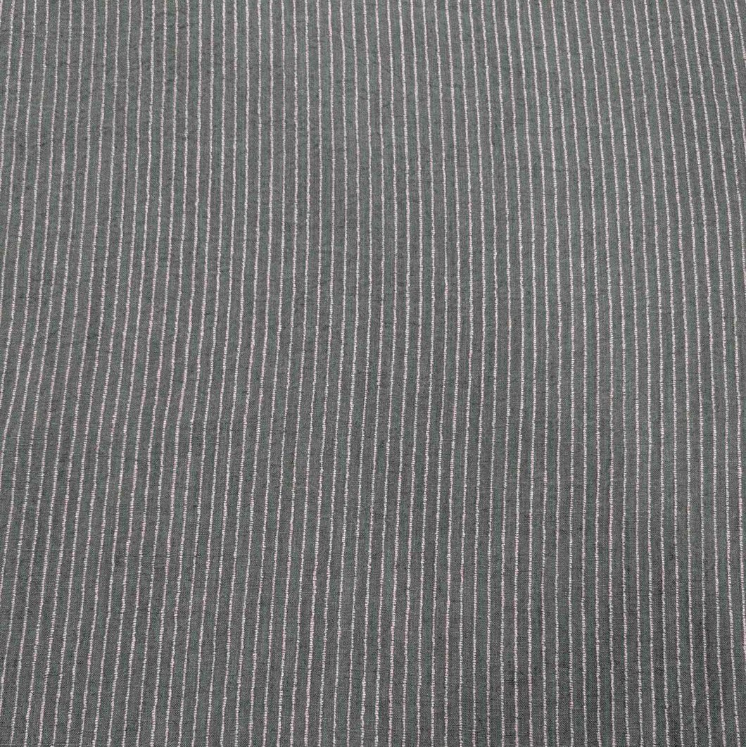 Close-up of olive fabric with white pinstripes. Available at Minerva's Bower