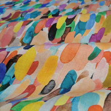 Load image into Gallery viewer, Close up drape of Pure midweight linen Confetti with vibrant multicolour painterly oval splashes now at Minerva&#39;s Bower