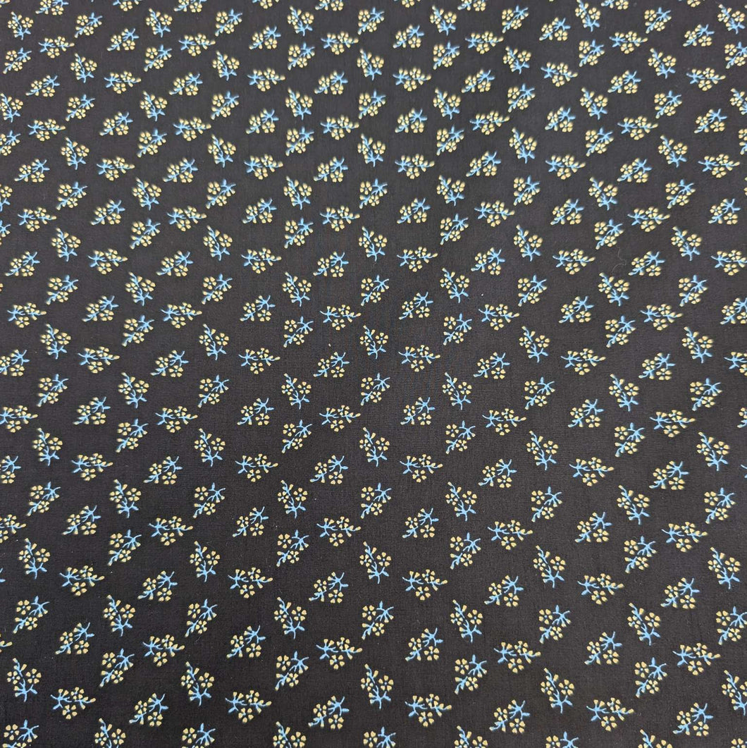 Japanese cotton fabric with a small floral pattern on a black base, for sale at Minerva's Bower