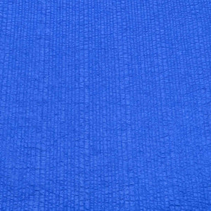 Flat lay of pure cotton voile seersucker self stripe, in cobalt colourway. Available at Minerva's Bower