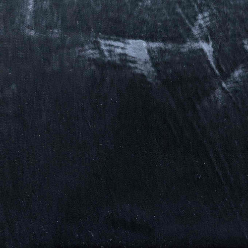 Flat lay of pure silk velvet in black colourway. Available at Minerva's Bower