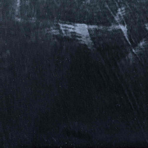 Flat lay of pure silk velvet in black colourway. Available at Minerva's Bower