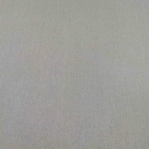 Flat lay of washed cotton drill in taupe colourway. Available at Minerva's Bower
