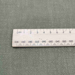 Flat lay of 100% Linen, Vintage Washer Finish, Olive, for sale at Minerva's Bower