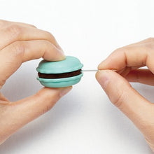 Load image into Gallery viewer, clover macaron in pistachio, showing needle sharpening, for sale at Minerva&#39;s Bower